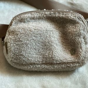 New Lululemon fleece everywhere belt bag. In the color white opal